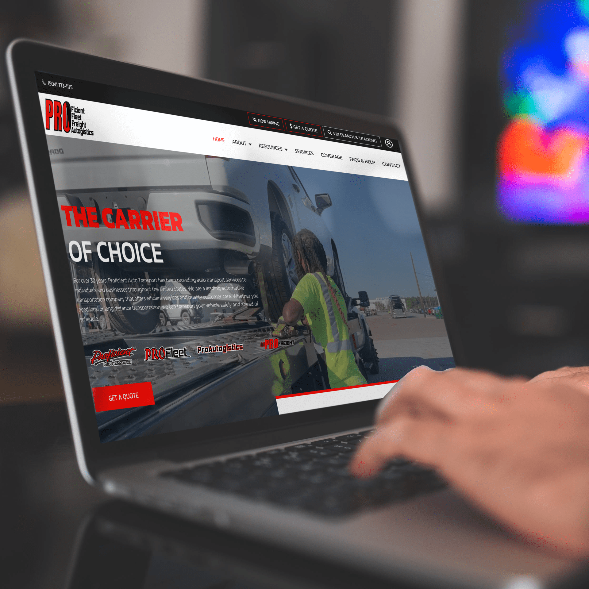 A digital mockup showcasing a sleek car on a highway, illustrating auto transport multimedia with dynamic elements.