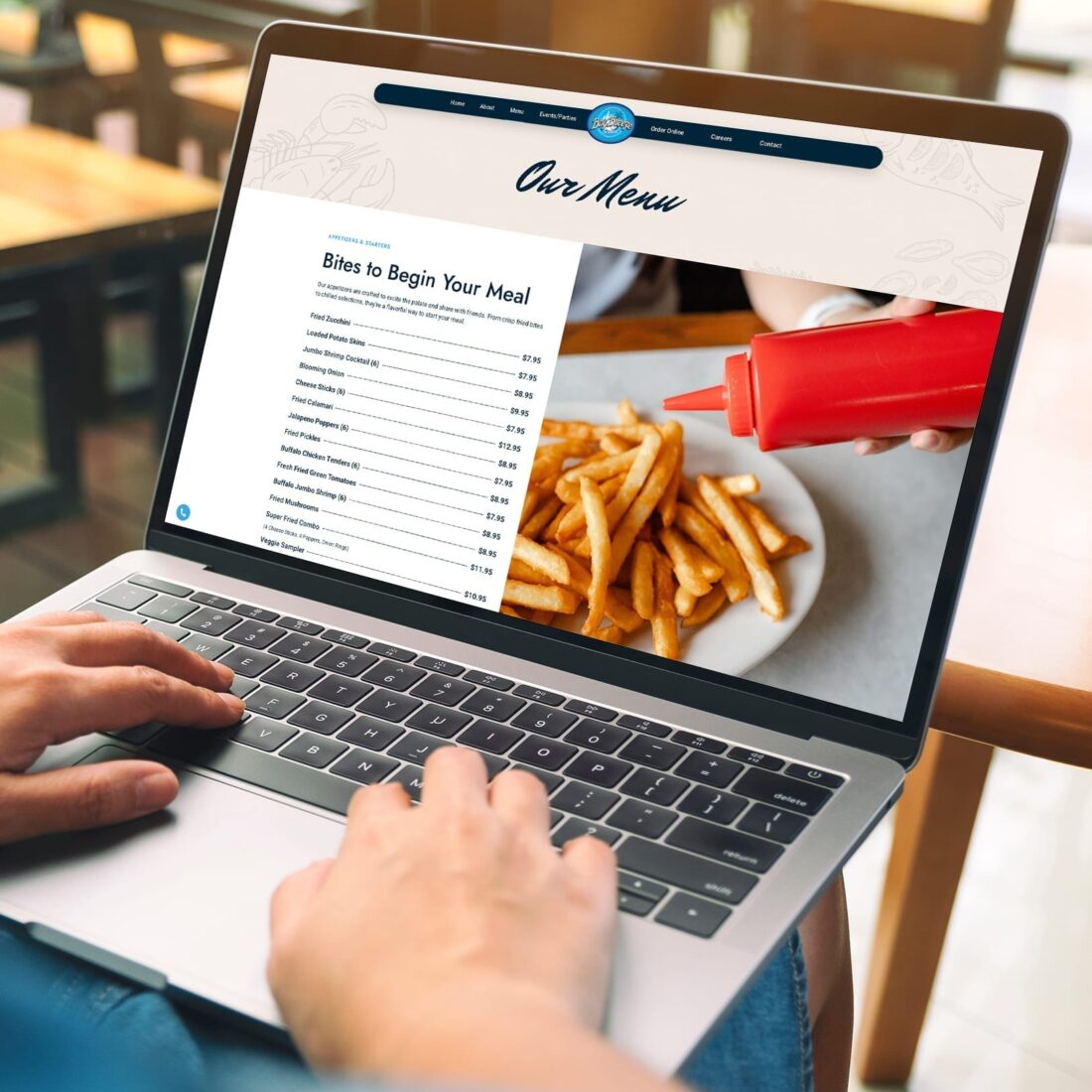 Bay Breeze Seafood website design mockup with a blue and white color scheme, showcasing menu and contact sections.